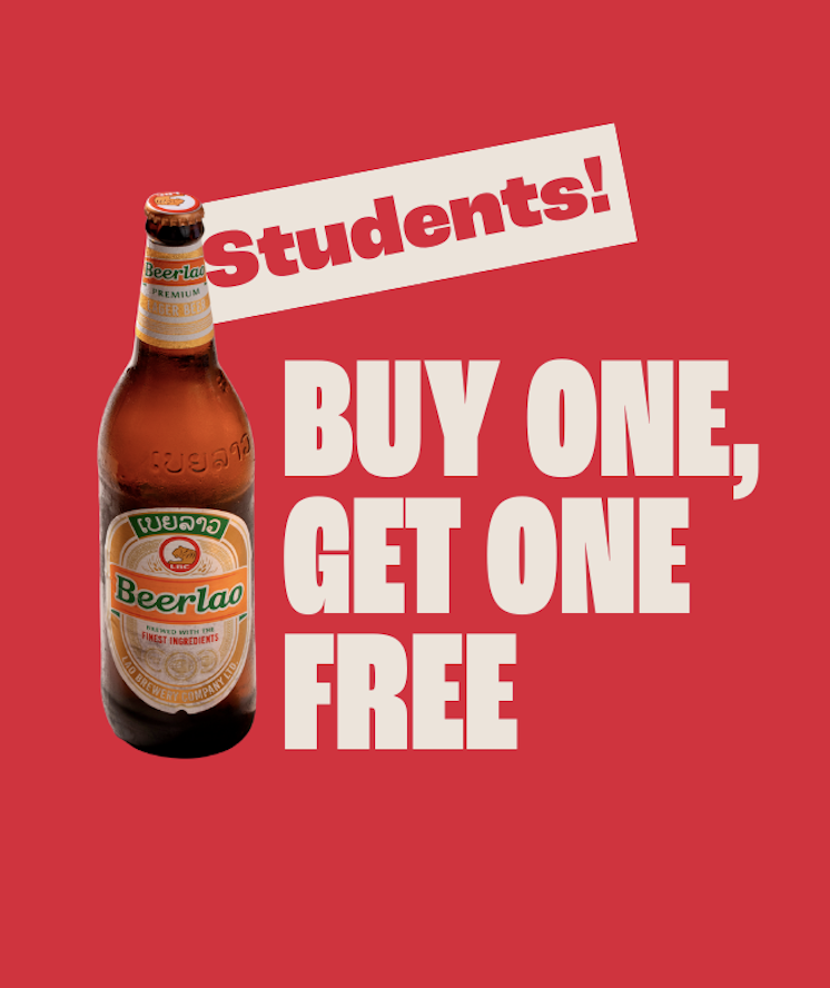 A bottle of Beerlao beer on a red background with bold white and red text: "Students! BUY ONE, GET ONE FREE.